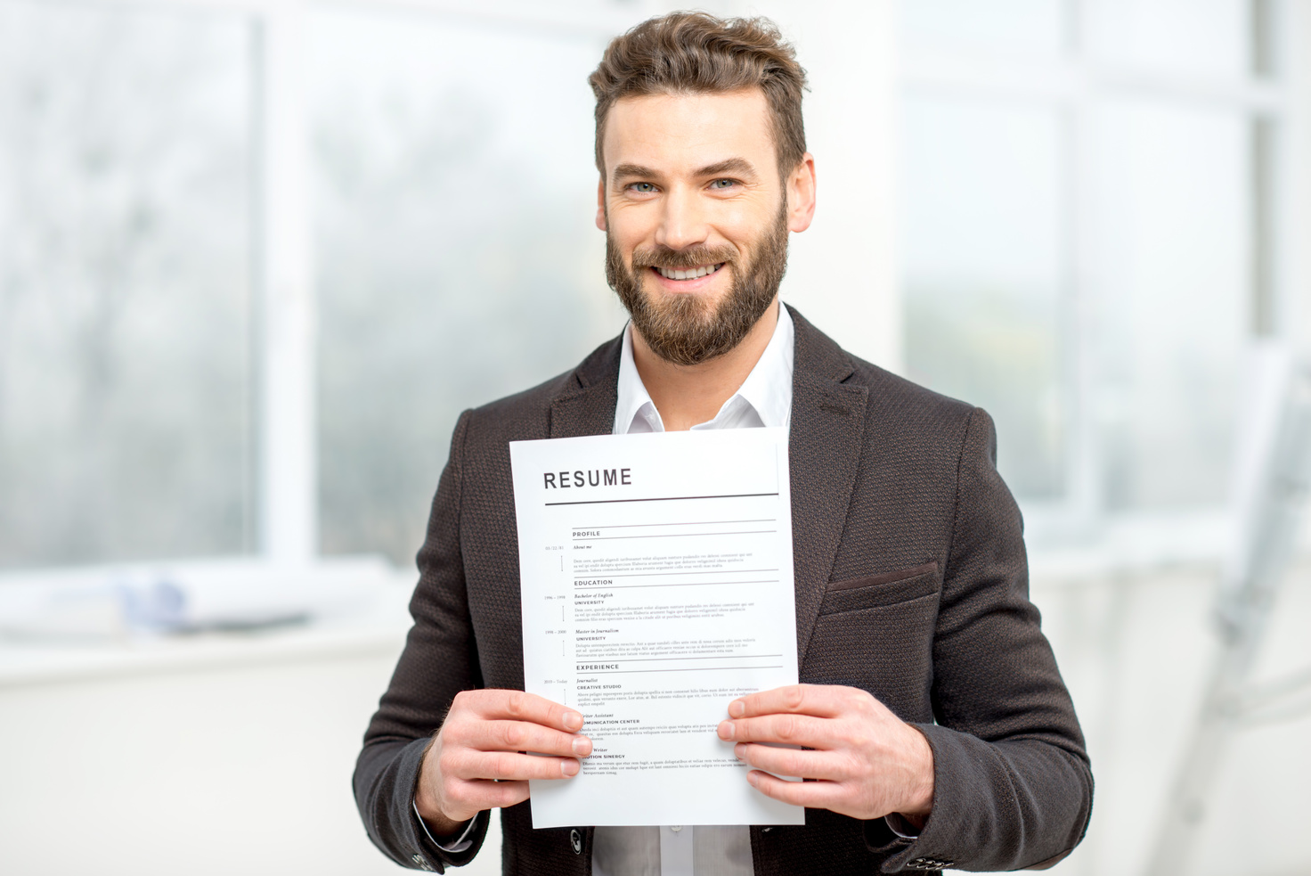 Man with Resume Paper